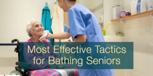 Elderly woman in wheel chair with caretaker touching face with wash cloth. Text reads: "most effective tactics for bathing seniors"